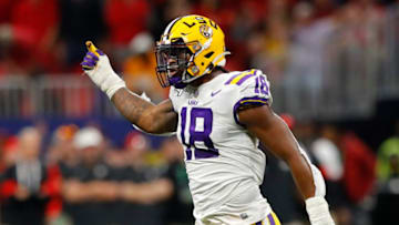 ATLANTA, GEORGIA - DECEMBER 07: K'Lavon Chaisson #18 of the LSU Tigers reacts in the first half against the Georgia Bulldogs during the SEC Championship game at Mercedes-Benz Stadium on December 07, 2019 in Atlanta, Georgia. (Photo by Kevin C. Cox/Getty Images)