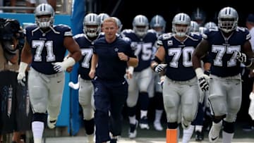 CHARLOTTE, NC - SEPTEMBER 09: Head coach Jason Garrett of the Dallas Cowboys takes the field against the Carolina Panthers at Bank of America Stadium on September 9, 2018 in Charlotte, North Carolina. (Photo by Streeter Lecka/Getty Images)