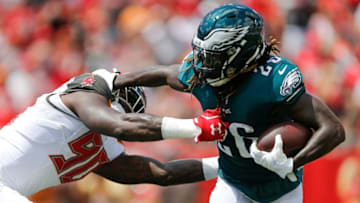 TAMPA, FL - SEPTEMBER 16: Jay Ajayi #26 of the Philadelphia Eagles stiff arms Jason Pierre-Paul #90 of the Tampa Bay Buccaneers during the first half at Raymond James Stadium on September 16, 2018 in Tampa, Florida. (Photo by Michael Reaves/Getty Images)