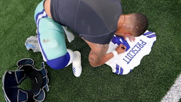 ARLINGTON, TX - SEPTEMBER 30: Dak Prescott #4 of the Dallas Cowboys signs his jersey after beating the Detroit Lions 26-24 at AT&T Stadium on September 30, 2018 in Arlington, Texas. (Photo by Tom Pennington/Getty Images)