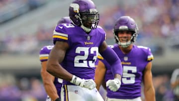 MINNEAPOLIS, MN - OCTOBER 14: George Iloka #23 of the Minnesota Vikings celebrates after making a tackle in the third quarter of the game against the Arizona Cardinals at U.S. Bank Stadium on October 14, 2018 in Minneapolis, Minnesota. (Photo by Adam Bettcher/Getty Images)