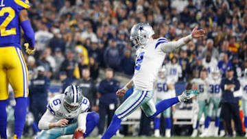 LOS ANGELES, CA - JANUARY 12: Kicker Brett Maher #2 of the Dallas Cowboys makes a point after a touchdown in the fourth quarter against the Los Angeles Rams to trail 30-22 in the NFC Divisional Round playoff game at Los Angeles Memorial Coliseum on January 12, 2019 in Los Angeles, California. (Photo by Meg Oliphant/Getty Images)