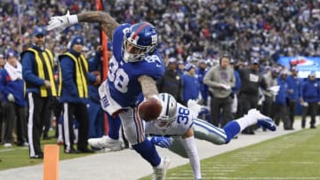 EAST RUTHERFORD, NEW JERSEY - DECEMBER 30: Evan Engram #88 of the New York Giants dives into the end zone for a touchdown during the third quarter of the game against the Dallas Cowboys at MetLife Stadium on December 30, 2018 in East Rutherford, New Jersey. (Photo by Sarah Stier/Getty Images)