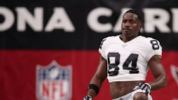 GLENDALE, ARIZONA - AUGUST 15: Wide receiver Antonio Brown #84 of the Oakland Raiders warms up before the NFL preseason game against the Arizona Cardinals at State Farm Stadium on August 15, 2019 in Glendale, Arizona. (Photo by Christian Petersen/Getty Images)