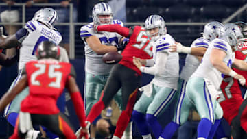 ARLINGTON, TEXAS - AUGUST 29: Mike White #3 of the Dallas Cowboys fumbles the ball against the Tampa Bay Buccaneers in the first quarter of a NFL preseason game at AT&T Stadium on August 29, 2019 in Arlington, Texas. (Photo by Tom Pennington/Getty Images)