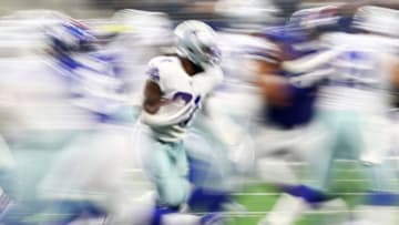 ARLINGTON, TEXAS - SEPTEMBER 08: Running back Ezekiel Elliott #21 of the Dallas Cowboys runs with the ball during the first quarter of the game against New York Giants at AT&T Stadium on September 08, 2019 in Arlington, Texas. (Photo by Ronald Martinez/Getty Images)