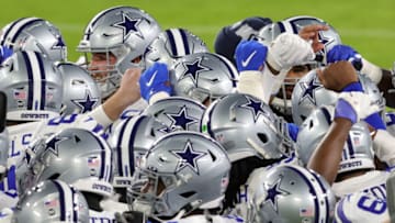 Dallas Cowboys huddle up (Photo by Rob Carr/Getty Images)