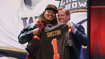 CHICAGO, IL - APRIL 30: Danny Shelton of the Washington Huskies hugs NFL Commissioner Roger Goodell after being picked #12 overall by the Cleveland Browns during the first round of the 2015 NFL Draft at the Auditorium Theatre of Roosevelt University on April 30, 2015 in Chicago, Illinois. (Photo by Jonathan Daniel/Getty Images)