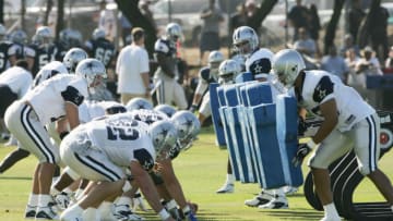 OXNARD, CA - JULY 30: Dallas Cowboys players go through drills during the first day of training camp on July 30, 2005 in Oxnard, California. (Photo by Stephen Dunn /Getty Images)
