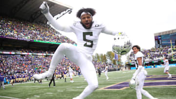 SEATTLE, WASHINGTON - OCTOBER 19: Kayvon Thibodeaux #5 of the Oregon Ducks celebrates after defeating the Washington Huskies 35-31 during their game at Husky Stadium on October 19, 2019 in Seattle, Washington. (Photo by Abbie Parr/Getty Images)