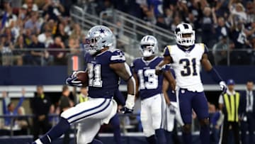 ARLINGTON, TEXAS - DECEMBER 15: Ezekiel Elliott #21 of the Dallas Cowboys runs for a touchdown against the Los Angeles Rams in the second quarter at AT&T Stadium on December 15, 2019 in Arlington, Texas. (Photo by Ronald Martinez/Getty Images)