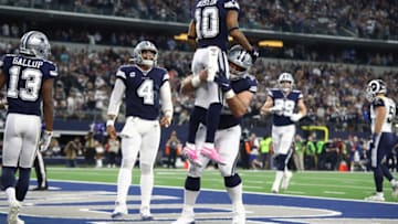 ARLINGTON, TEXAS - DECEMBER 15: Tavon Austin #10 of the Dallas Cowboys celebrates a touchdown with Travis Frederick #72 and Dak Prescott #4 in the second quarter against the Los Angeles Rams at AT&T Stadium on December 15, 2019 in Arlington, Texas. (Photo by Ronald Martinez/Getty Images)