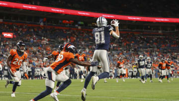 DENVER, CO - AUGUST 13: Simi Fehoko #81 of the Dallas Cowboys catches a touchdown pass against the Denver Broncos during the fourth quarter at Empower Field At Mile High on August 13, 2022 in Denver, Colorado. (Photo by C. Morgan Engel/Getty Images)