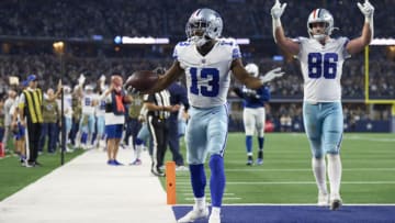 ARLINGTON, TX - DECEMBER 04: Michael Gallup #13 of the Dallas Cowboys celebrates after scoring a touchdown against the Indianapolis Colts during the first half at AT&T Stadium on December 4, 2022 in Arlington, Texas. (Photo by Cooper Neill/Getty Images)