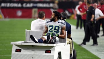 GLENDALE, AZ - SEPTEMBER 30: Defensive back Earl Thomas #29 of the Seattle Seahawks leaves the field on a cart after being injured during the fourth quarter against the Arizona Cardinals at State Farm Stadium on September 30, 2018 in Glendale, Arizona. (Photo by Norm Hall/Getty Images)