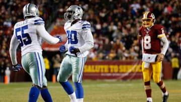 LANDOVER, MD - DECEMBER 7: Defensive end Demarcus Lawrence #90 and middle linebacker Rolando McClain #55 of the Dallas Cowboys react to a play while quarterback Kirk Cousins #8 of the Washington Redskins looks on in the third quarter at FedExField on December 7, 2015 in Landover, Maryland. (Photo by Rob Carr/Getty Images)