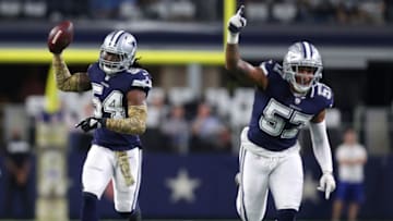 ARLINGTON, TX - NOVEMBER 05: Jaylon Smith #54 and Damien Wilson #57 of the Dallas Cowboys celebrate a first quarter fumble recovery against the Tennessee Titans in the first half of a game at AT&T Stadium on November 5, 2018 in Arlington, Texas. (Photo by Tom Pennington/Getty Images)