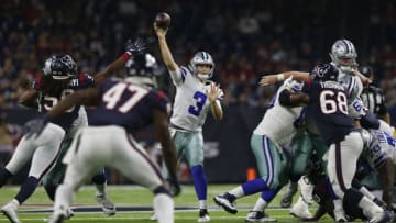 HOUSTON, TX - AUGUST 30: Mike White #3 of the Dallas Cowboys throws a pass defended by Peter Kalambayi #58 of the Houston Texans in the second half of the preseason game at NRG Stadium on August 30, 2018 in Houston, Texas. (Photo by Tim Warner/Getty Images)