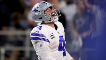 ARLINGTON, TEXAS - JANUARY 05: Dak Prescott #4 of the Dallas Cowboys reacts after carrying the ball against the Seattle Seahawks in the fourth quarter during the Wild Card Round at AT&T Stadium on January 05, 2019 in Arlington, Texas. (Photo by Tom Pennington/Getty Images)