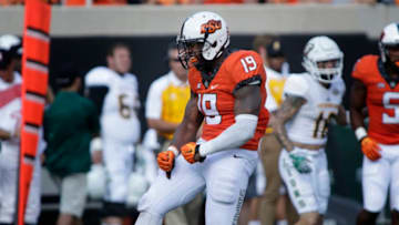 STILLWATER, OK - SEPTEMBER 3 : Linebacker Justin Phillips #19 of the Oklahoma State Cowboys celebrates a quarterback sack against the Southeastern Louisiana Lions September 3, 2016 at Boone Pickens Stadium in Stillwater, Oklahoma. The Cowboys defeated the Lions 61-7. (Photo by Brett Deering/Getty Images)