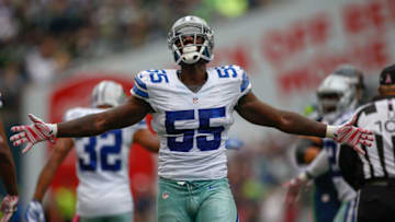 SEATTLE, WA - OCTOBER 12: Linebacker Rolando McClain #55 of the Dallas Cowboys celebrates after tackling running back Marshawn Lynch of the Seattle Seahawks in the first half at CenturyLink Field on October 12, 2014 in Seattle, Washington. The Cowboys defeated the Seahawks 30-23. (Photo by Otto Greule Jr/Getty Images)