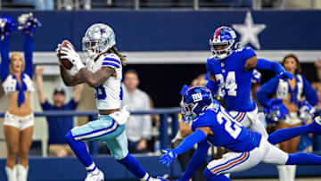 ARLINGTON, TEXAS - OCTOBER 10: CeeDee Lamb #88 of the Dallas Cowboys catches a touchdown pass during a game against the New York Giants at AT&T Stadium on October 10, 2021 in Arlington, Texas. The Cowboys defeated the Giants 44-20. (Photo by Wesley Hitt/Getty Images)