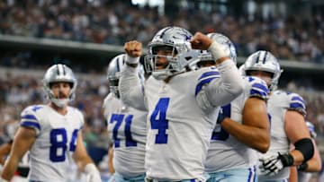 ARLINGTON, TEXAS - NOVEMBER 14: Dak Prescott #4 of the Dallas Cowboys celebrates his rushing touchdown against the Atlanta Falcons during the third quarter at AT&T Stadium on November 14, 2021 in Arlington, Texas. (Photo by Richard Rodriguez/Getty Images)
