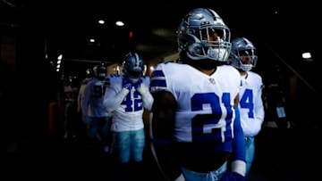 EAST RUTHERFORD, NEW JERSEY - DECEMBER 19: Ezekiel Elliott #21, Dak Prescott #4, and Keanu Neal #42 of the Dallas Cowboys wait in the tunnel before the game against the New York Giants at MetLife Stadium on December 19, 2021 in East Rutherford, New Jersey. (Photo by Sarah Stier/Getty Images)