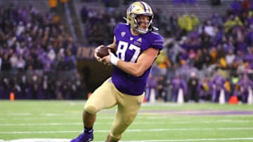 SEATTLE, WASHINGTON - NOVEMBER 13: Cade Otton #87 of the Washington Huskies runs with the ball against the Arizona State Sun Devils during the first quarter at Husky Stadium on November 13, 2021 in Seattle, Washington. (Photo by Abbie Parr/Getty Images)