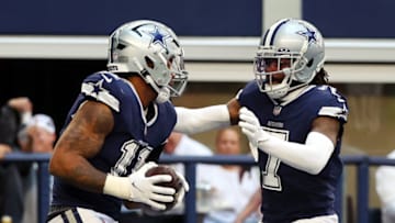 ARLINGTON, TEXAS - OCTOBER 30: Micah Parsons #11 of the Dallas Cowboys celebrates with Trevon Diggs #7 after a touchdown from a recovered fumble against the Chicago Bears at AT&T Stadium on October 30, 2022 in Arlington, Texas. (Photo by Richard Rodriguez/Getty Images)