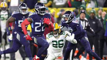 GREEN BAY, WISCONSIN - NOVEMBER 17: Derrick Henry #22 of the Tennessee Titans runs with the ball after a reception against the Green Bay Packers during the third quarter in the game at Lambeau Field on November 17, 2022 in Green Bay, Wisconsin. (Photo by Stacy Revere/Getty Images)