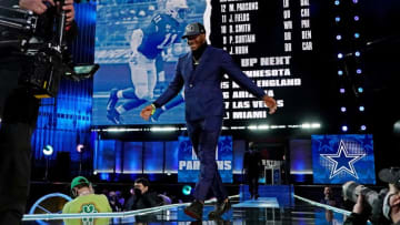 Apr 29, 2021; Cleveland, Ohio, USA; Micah Persons (Penn State) walks on stage after being selected by the Dallas Cowboys as the number 12 overall pick in the first round of the 2021 NFL Draft at First Energy Stadium. Mandatory Credit: Kirby Lee-USA TODAY Sports