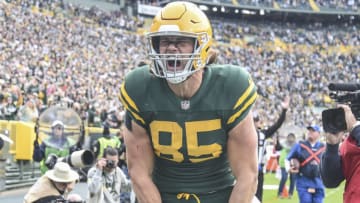 Oct 24, 2021; Green Bay, Wisconsin, USA; Green Bay Packers tight end Robert Tonyan (85) celebrates after catching a touchdown pass in the third quarter during the game against the Washington Football Team at Lambeau Field. Mandatory Credit: Benny Sieu-USA TODAY Sports