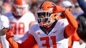 Nov 6, 2021; Minneapolis, Minnesota, USA; Illinois Fighting Illini defensive back Devon Witherspoon (31) celebrates a win against the Minnesota Golden Gophers in the fourth quarter at Huntington Bank Stadium. Mandatory Credit: Matt Krohn-USA TODAY Sports