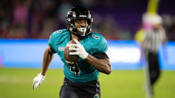 Dec 17, 2021; Orlando, Florida, USA; Coastal Carolina Chanticleers tight end Isaiah Likely (4) runs with the ball during the second half against the Northern Illinois Huskies during the 2021 Cure Bowl at Exploria Stadium. Mandatory Credit: Matt Pendleton-USA TODAY Sports