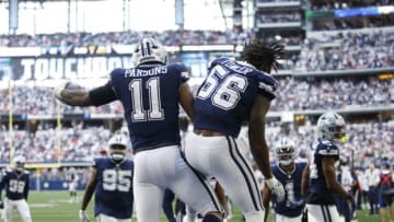 Oct 30, 2022; Arlington, Texas, USA; Dallas Cowboys linebacker Micah Parsons (11) and defensive end Dante Fowler Jr. (56) celebrate a touchdown in the third quarter against the Chicago Bears at AT&T Stadium. Mandatory Credit: Tim Heitman-USA TODAY Sports