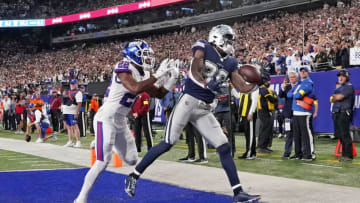 Sep 26, 2022; East Rutherford, NJ, USA; Dallas Cowboys wide receiver CeeDee Lamb (88) makes a touchdown catch over New York Giants cornerback Adoree' Jackson (22) during the second half at MetLife Stadium. Mandatory Credit: Robert Deutsch-USA TODAY Sports