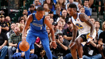 DALLAS, TX - OCTOBER 23: Dennis Smith Jr. #1 of the Dallas Mavericks handles the ball against the Golden State Warriors on October 23, 2017 at the American Airlines Center in Dallas, Texas. NOTE TO USER: User expressly acknowledges and agrees that, by downloading and or using this photograph, User is consenting to the terms and conditions of the Getty Images License Agreement. Mandatory Copyright Notice: Copyright 2017 NBAE (Photo by Glenn James/NBAE via Getty Images)