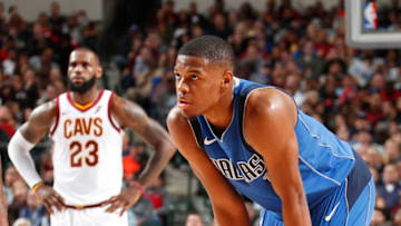 DALLAS, TX - NOVEMBER 11: Dennis Smith Jr. #1 of the Dallas Mavericks and Lebron James #23 of the Cleveland Cavaliers look on during the game on Novemeber 11, 2017 at the American Airlines Center in Dallas, Texas. NOTE TO USER: User expressly acknowledges and agrees that, by downloading and or using this photograph, User is consenting to the terms and conditions of the Getty Images License Agreement. Mandatory Copyright Notice: Copyright 2017 NBAE (Photo by Danny Bollinger/NBAE via Getty Images)