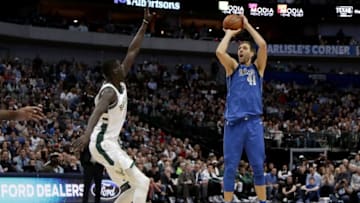 DALLAS, TX - NOVEMBER 18: Dirk Nowitzki #41 of the Dallas Mavericks shoots the ball against Thon Maker #7 of the Milwaukee Bucks in the first half at American Airlines Center on November 18, 2017 in Dallas, Texas. NOTE TO USER: User expressly acknowledges and agrees that, by downloading and or using this photograph, User is consenting to the terms and conditions of the Getty Images License Agreement. (Photo by Tom Pennington/Getty Images)