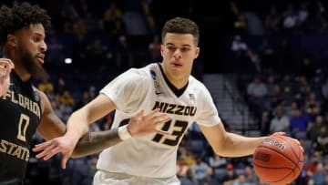 NASHVILLE, TN - MARCH 16: Michael Porter Jr. #13 of the Missouri Tigers plays against Phil Cover #0 of the Florida State Seminoles during the first round of the 2018 NCAA Men's Basketball Tournament at Bridgestone Arena on March 16, 2018 in Nashville, Tennessee. (Photo by Frederick Breedon/Getty Images)