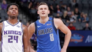 SACRAMENTO, CA - MARCH 27: Kyle Collinsworth #8 of the Dallas Mavericks faces off against Buddy Hield #24 of the Sacramento Kings on March 27, 2018 at Golden 1 Center in Sacramento, California. NOTE TO USER: User expressly acknowledges and agrees that, by downloading and or using this photograph, User is consenting to the terms and conditions of the Getty Images Agreement. Mandatory Copyright Notice: Copyright 2018 NBAE (Photo by Rocky Widner/NBAE via Getty Images)