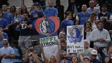 DALLAS, TX - MARCH 30: fans hold signs during the game between the Minnesota Timberwolves and Dallas Mavericks on March 30, 2018 at the American Airlines Center in Dallas, Texas. NOTE TO USER: User expressly acknowledges and agrees that, by downloading and or using this photograph, User is consenting to the terms and conditions of the Getty Images License Agreement. Mandatory Copyright Notice: Copyright 2018 NBAE (Photo by Glenn James/NBAE via Getty Images)