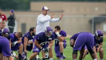 Jul 25, 2014; Mankato, MN, USA; Minnesota Vikings offensive line coach Jeff Davidson instructs his players in drills at training camp at Minnesota State University. Mandatory Credit: Bruce Kluckhohn-USA TODAY Sports