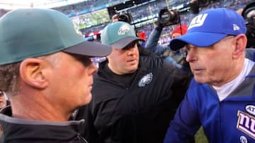 Jan 3, 2016; East Rutherford, NJ, USA; New York Giants head coach Tom Coughlin (R) shakes hands with Philadelphia Eagles interim head coach Pat Shurmur (L) after their game at MetLife Stadium. The Eagles won 35-30. Mandatory Credit: Brad Penner-USA TODAY Sports