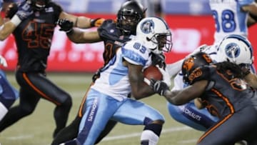 Aug 17, 2014; Toronto, Ontario, Canada; Toronto Argonauts kick returner Terrell Sinkfield (83) returns a kick against the BC Lions at Rogers Centre. BC defeated Toronto 33-17. Mandatory Credit: John E. Sokolowski-USA TODAY Sports