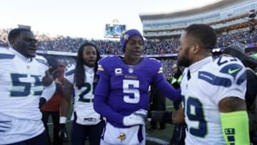 Jan 10, 2016; Minneapolis, MN, USA; Minnesota Vikings quarterback Teddy Bridgewater (5) greets Seattle Seahawks free safety Earl Thomas (29) after a NFC Wild Card playoff football game at TCF Bank Stadium. Mandatory Credit: Bruce Kluckhohn-USA TODAY Sports