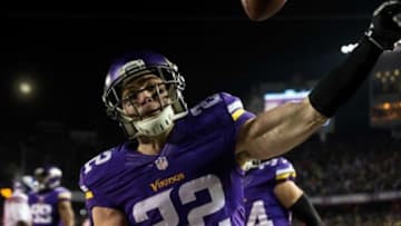 Dec 27, 2015; Minneapolis, MN, USA; Minnesota Vikings safety Harrison Smith (22) celebrates his interception for a touchdown during the second quarter against the New York Giants at TCF Bank Stadium. Mandatory Credit: Brace Hemmelgarn-USA TODAY Sports