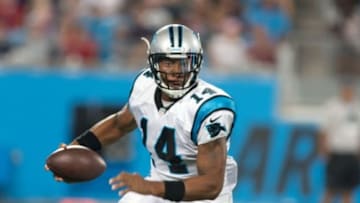 Aug 28, 2015; Charlotte, NC, USA; Carolina Panthers quarterback Joe Webb (14) runs the ball during the fourth quarter against the New England Patriots at Bank of America Stadium. The Patriots defeated the Panthers 17-16. Mandatory Credit: Jeremy Brevard-USA TODAY Sports