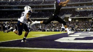 Oct 29, 2015; Fort Worth, TX, USA; TCU Horned Frogs wide receiver Josh Doctson (9) catches a touchdown pass past West Virginia Mountaineers cornerback Terrell Chestnut (16) during the first quarter at Amon G. Carter Stadium. Mandatory Credit: Kevin Jairaj-USA TODAY Sports